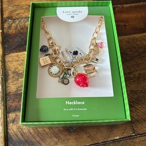 Kate Spade Gold Charm Necklace with Red and Black Accents